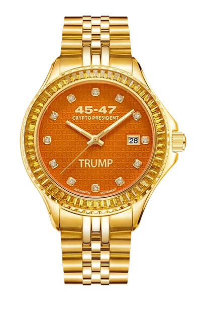 Gold watch with orange face featuring diamond hour markers, text '45-47 Crypto President TRUMP', and a date display showing 28.