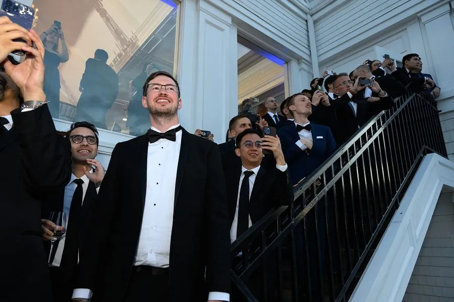 VIP guests in black tie at the reception